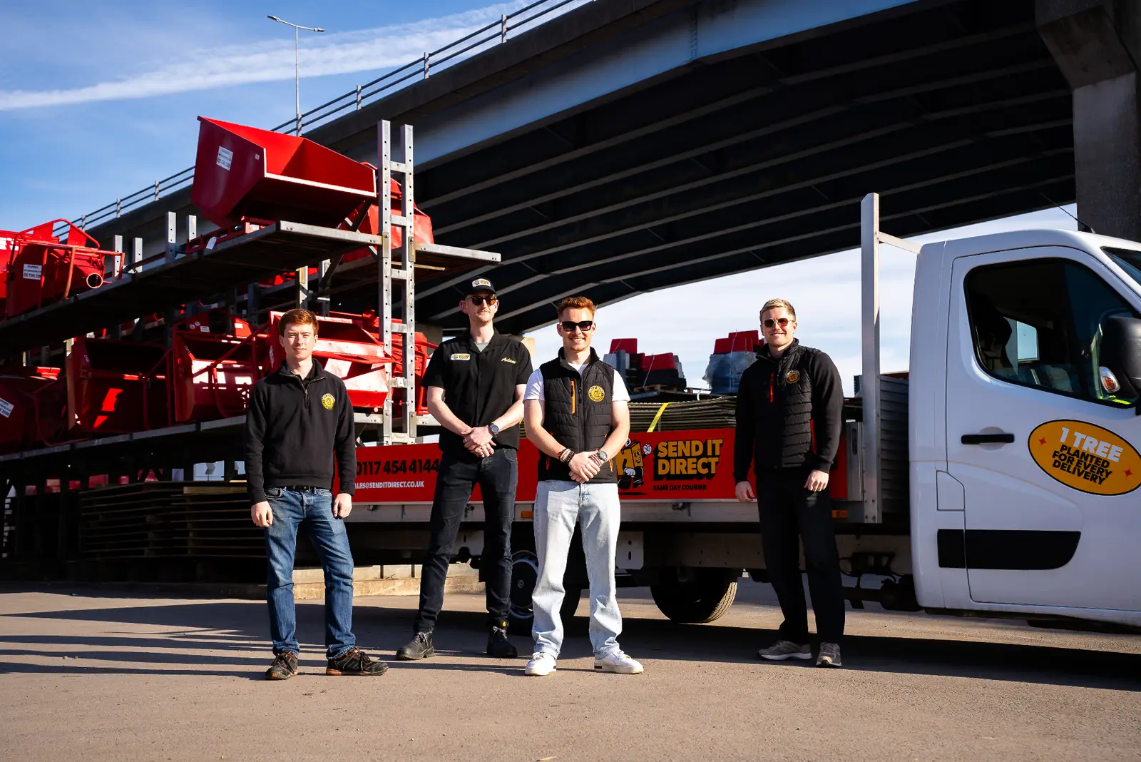 The Send It Direct team in Bristol with liveried courier vehicles