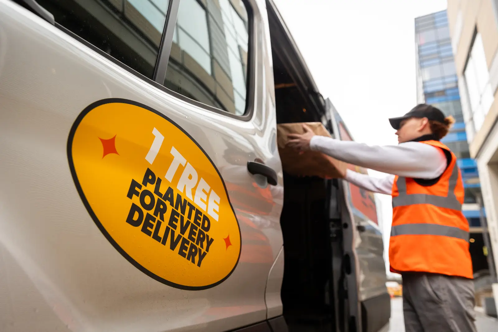 Send It Direct van with tree planted badge for carbon-neutral delivery