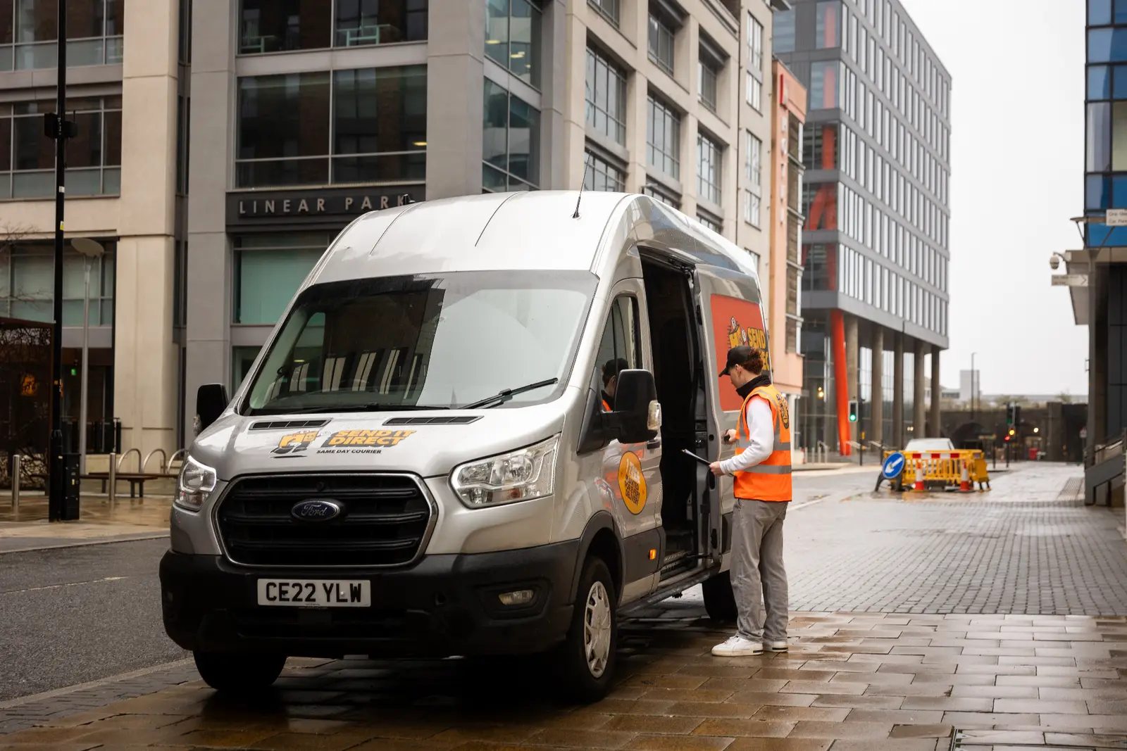 Same-day courier van making a business delivery in central London