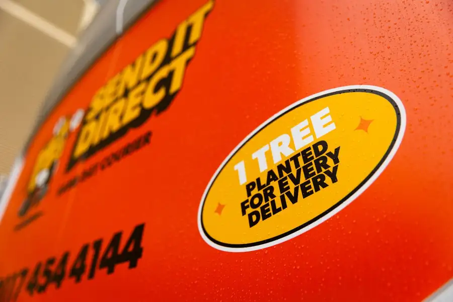 Send It Direct van showing 1 Tree Planted for Every Delivery badge